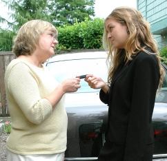 Handing over the car keys.
